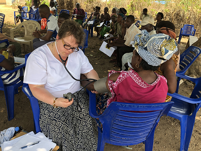 CCH Delora Schmidt RN Africa 2018 blood pressure check nurse