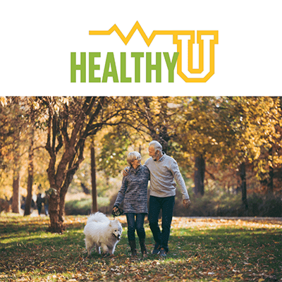 HealthyU logo plus woman and man walking in park